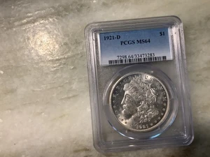 1921-D Silver Morgan Dollar MS64 - Picture 1 of 2