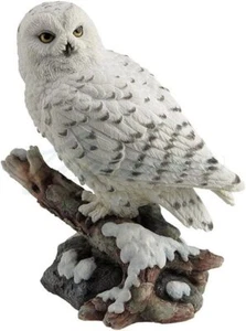 Schneeeule sitzt auf Ast Figur - Bild 1 von 1