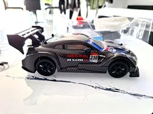 Voiture Drift Télécommandée Black Nissan NEUVE✅ Livraison Offerte 🔥 - Photo 1/8
