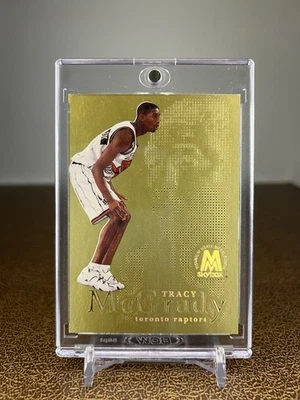 SkyBox 1998-99 metal fundido Tracy McGrady Fusion titanio oro Foto 1 de 3
