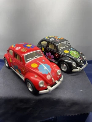 Two 5" Kinsmart 1967 Volkswagen Beetle w/ Flower Power Decal  1:32 Black& Red - Image 1 of 4