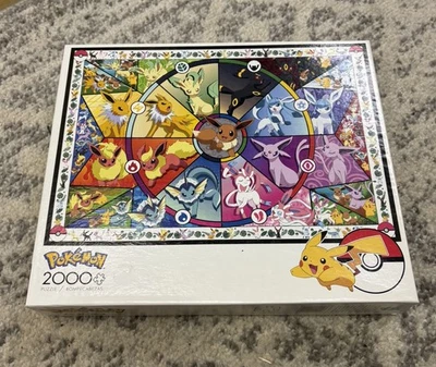 Rompecabezas Pokemon Buffalo Games - Eevee's vitral 2000 piezas Foto 1 de 3