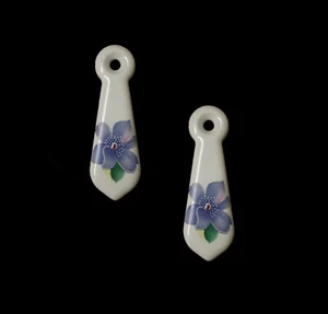 1 par de escudos de porcelana blanca/cubiertas de ojo de cerradura diseño Tropicana - Imagen 1 de 1