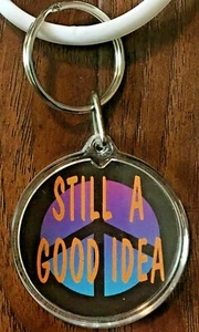 Peace Sign Symbol "Still A Good Idea" Keychain NOS Keyring, Round Colorful New - Picture 1 of 3