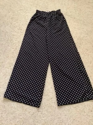 Pantalones de pierna ancha Philosophy para mujer lunares negros y rosas talla S Foto 1 de 4