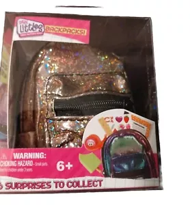Real Little glänzend rosa Rucksack Tasche NEU 6 Überraschungen von Elch ideal für Puppen - Bild 1 von 9