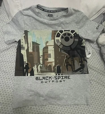 Camiseta Gris Aguja Negra Parques Disney Star Wars Outpost Talla Juvenil Pequeña Foto 1 de 4