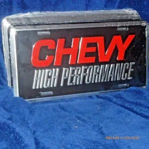 CHEVY HIGH PREFORMANCE ROTE UND SILBERNE BUCHSTABEN UND SCHWARZER HINTERGRUND - Bild 1 von 2