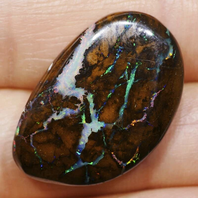 27.05 ct Multicolor Boulder Matrix Edelopal Opal Edelstein Cabochon Australien - Bild 1 von 4
