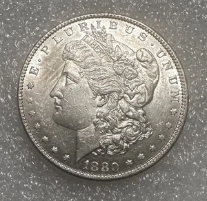 1880-O $1 dólar de plata Morgan Nueva Orleans sin circular - Imagen 1 de 3