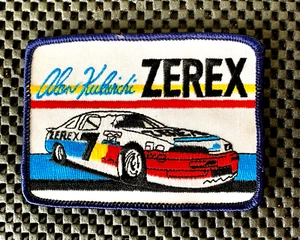ALAN KULWICKI ZEREX CAR # 7 NASCAR RICAMATO CUCITO SU TOPPA 4 1/4" x 3" NOS - Foto 1 di 2