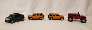 McDonalds Spielzeugauto 4 Stück SUV Hummer - Bild 1 von 16