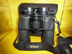 Binoculares Nikon Aculon A211 negros 12x50 con estuche/correa/manual/cubiertas de lentes - Imagen 1 de 9