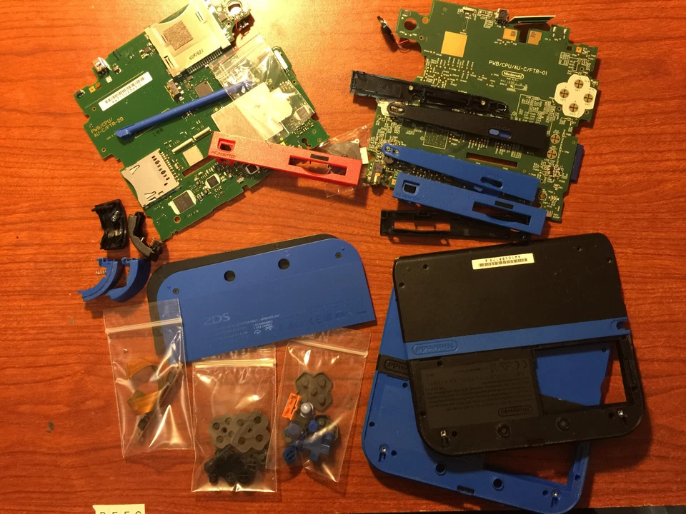 OEM Nintendo 2DS Orig. Replacement Parts Buttons Plastic Housing Motherboard USA - Image 1 of 1