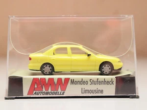 MODELLAUTO 1:87: FORD MONDEO STUFENHECK, gelb, AMW/AWM 0410, NEU & OVP, 5-6 - Bild 1 von 3