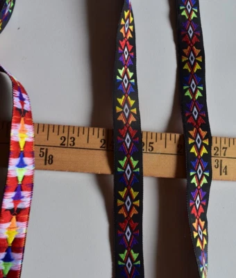 JACQUARD NATIV  DESIGN  BRAID TRIM ON BLACK  BY THE YARD  X  3/4  INCHES WIDE - Image 1 of 2