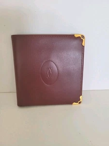 Must de Cartier Herren-Geldbörse aus Leder mit Doppelfaltung bordeauxrot Medium Kartenschein toll - Bild 1 von 11