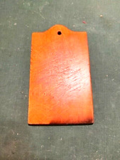 EARLY 19OOS MINIATURE TOMBSTONE SHAPED CUTTING BOARD WITH HOLE FOR HANGING