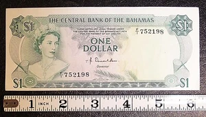 Billete de $1 de Bahamas L.1974 P-35a AU/UNC F/I #15590 - Imagen 1 de 2