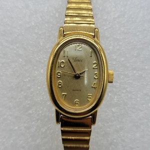 Reloj Timex 1996 de colección para mujer esfera ovalada de 18 mm banda elástica tono dorado, funciona - Imagen 1 de 15