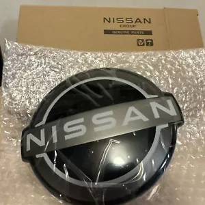 NEW OEM Nissan 2023 Rogue Grille Emblem 62890-6RM0A - Picture 1 of 4