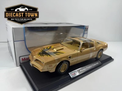 Литая модель автомобиля Maisto Pontiac Firebird Trans Am в золоте 1:18 - Изображение 1 из 4