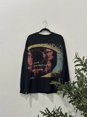 Camiseta Travis Scott Cactus Jack Astroworld Houston Eyes Manga Larga Grande Foto 1 de 4