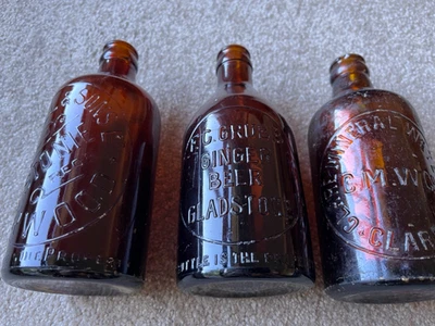Collection of 3 Amber Ginger Beer dumpy bottles - image 1 of 4