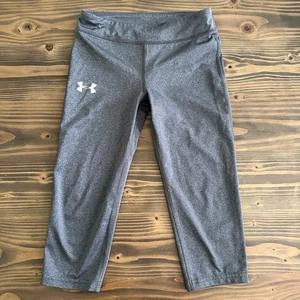 Leggings Capri grigi Under Armour bambina M pantaloni sportivi HeatGear giovanili - Foto 1 di 3