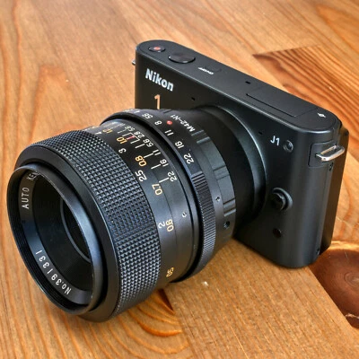 Nikon 1 J1 + Kennex 35 mm Objektiv (10,1 Megapixel, 1315 Auslösungen) - Bild 1 von 4