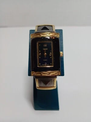 Reloj brazalete para mujer Bijoux Turner dorado y cobre probado Foto 1 de 4