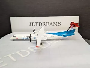 1/200 LUXAIR (LUXEMBOURG) BOMBARDIER Q400-8 / DASH-8 2007'S COLORS LX-LGM HERPA - Picture 1 of 9