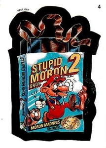 Pegatina 1991 Topps Wacky Packages Stupid Moron 2 4 - Imagen 1 de 2