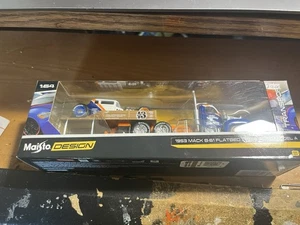 MAISTO 1953 B-61 MACK PRITSCHE + 1929 FORD MODEL A 1:64 NEU AUF BLISTER - Bild 1 von 4