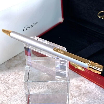 Bolígrafo Cartier Santos acero lacado y acabado oro 18K con caja Foto 1 de 4