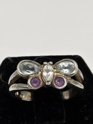 Anillo Mariposa Multistone Talla 6 Esterlina Con Piedras Púrpura, Azul Y Transparente Foto 1 de 4