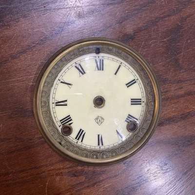 "Antiguo reloj con bisagras de porcelana Ansonia esfera y bisel con vidrio 5 1/8""" Foto 1 de 4