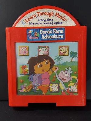A32 Fisher-Price Mattel Learn Through Music Cartridge Dora's Farm Adventure 2002 - Image 1 of 2