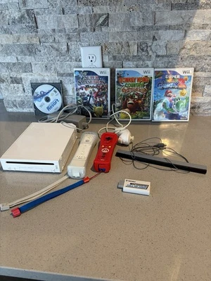 Nintendo Wii Console Bundle- 1080p HDMI Adaptor, 4 Games, 2 Motion Plus Remotes - Image 1 of 4