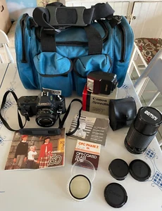 Cámara Canon T50 SLR 35 mm + Flash Speedlite 244T + Estuche de transporte + Lente zoom + Filtro - Imagen 1 de 19