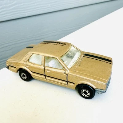 1/64 VINTAGE ORIGINAL MATCHBOX 1979 SUPERFAST #55 FORD CORTINA GOLD W STRIPE - Image 1 of 4