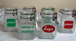NUEVO EN CAJA 6 frascos de abrazadera de vidrio para vacaciones/navidad paz/saludos de temporada/esperanza frascos de regalo - Imagen 1 de 4