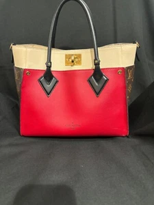 Louis Vuitton Echtleder Handtasche mit Canvas Monogramm Seiten On My Side - Bild 1 von 8