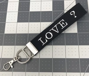 Llavero de tela personalizado, llavero con monograma con llavero giratorio - Imagen 1 de 5