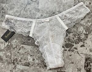 NWT FREDERICK'S OF HOLLYWOOD LUCIA ROSE FLORAL BOW WHITE CHEEKY THONG PANTIES