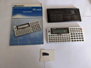 sharp pc 1403 s'allume, les touches fonctionnent calculator calculatrice - Photo 1/4