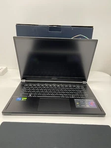 MSI Stealth 15 A13VE-044AU 15 inch Intel Core i7 13th Gen 16GB RAM 512GB SSD RTX - Picture 1 of 5
