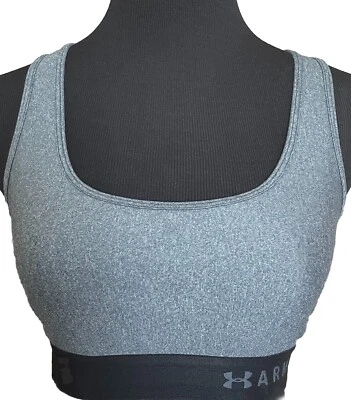 Sujetador deportivo de compresión Under Armour gris y negro para mujer talla mediana M usado en excelente estado Foto 1 de 4