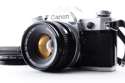 Canon AE-1 silber / Objektiv Neu FD 50mm f/1.8 TOP + SLR Y3323 - Bild 1 von 4