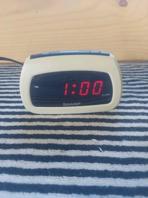 Mini Sharp SPC085 Small Digital Alarm Clock w/Battery Backup and Snooze Button - Image 1 of 4
